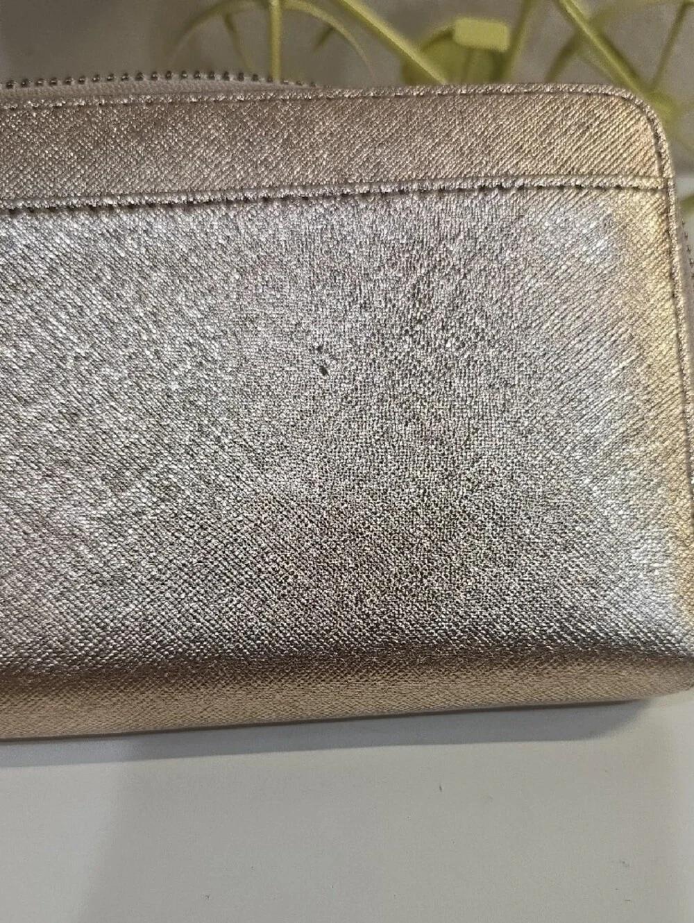 kate spade metallic rose gold zip-around continental wallet